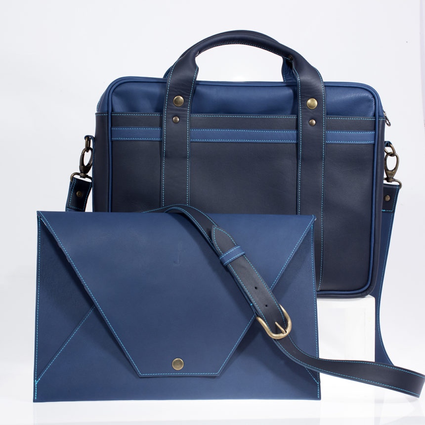 cartable en cuir bleu marine et bleu roy avec son porte document assortie en cuir bleu roy, doublure bleu en wax