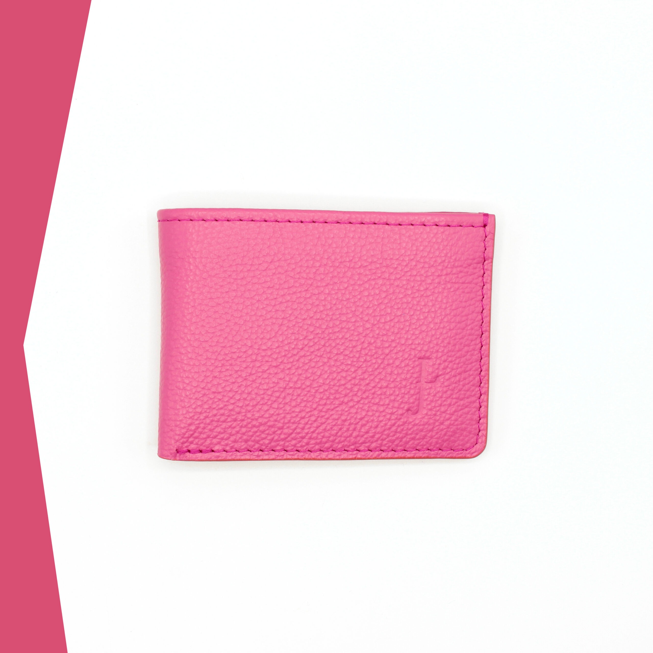 Calypso, un portefeuille en cuir fuchsia de la gamme Lou s'enjaille, fabrication artisanale. Calypso, un portefeuille en cuir fuchsia de la gamme Lou s'enjaille, fabrication artisanale.